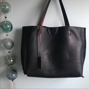 Street Level Reversible Black Leather Tote